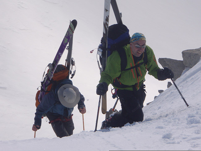 Mike and Guy bootpacking up the last steep of Col du Tour